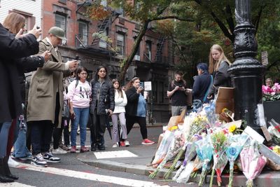 ‘Friends kind of saved my life’: Grieving fans flock to New York apartment to mourn Matthew Perry