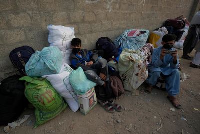 Afghans in droves head to border to leave Pakistan ahead of a deadline in anti-migrant crackdown