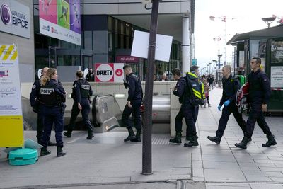 Paris police open fire on a woman who allegedly made threats in the latest security incident