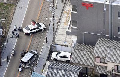 Japan police arrest suspected gunman after hostage standoff