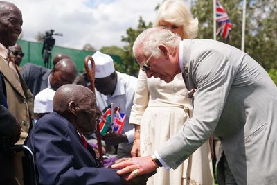 Charles presents medals to Kenyan thought to be one of oldest veterans