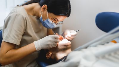 How does plaque cause cavities?
