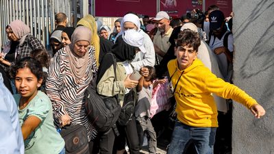 First foreigners evacuated from Gaza through Rafah crossing into Egypt