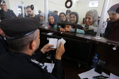 As more Palestinians with foreign citizenship leave Gaza, some families are left in the lurch