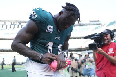 Why does Philadelphia Eagles player AJ Brown wear pink shoes?