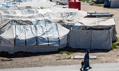 Australia has no legal obligation to repatriate 31 women and children held in Syrian camp, court rules