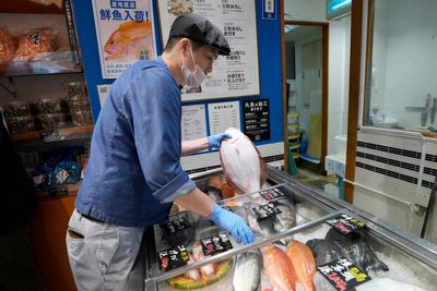 Japanese consumers are eating more local fish in spite of China's ban due to Fukushima wastewater