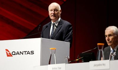 Qantas chairman heckled by shareholders at AGM as investors reject executive pay plans