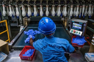 More medical gloves are coming from China, as U.S. makers of protective gear struggle