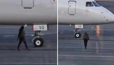 Woman arrested after running onto airport tarmac and trying to flag down missed plane