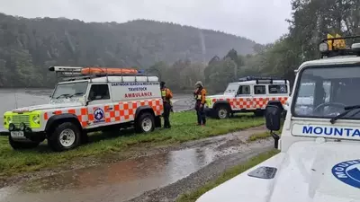 Woman dies after being rescued from car that plunged into Devon river