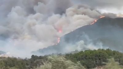 Wildfire rages amid strong winds in Valencia forcing evacuations of hundreds