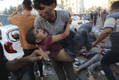 Israeli air strike on ambulances kills 15, injures 60, Gaza officials say