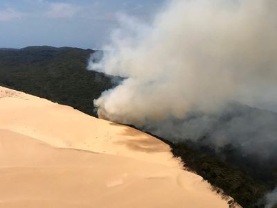 Three killed as firefighting plane crashes in ‘difficult terrain’ in Australia