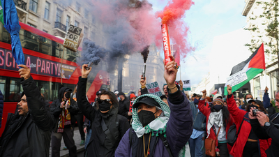 Watch: Pro-Palestine demonstrators march through central London
