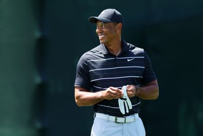 Social media is going nuts over a video of Tiger Woods caddying for Charlie, walking without a limp