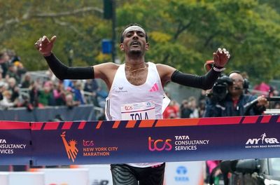 Tamirat Tola breaks course record with triumph in New York City Marathon