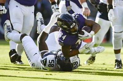 Undrafted rookie Keaton Mitchell rolls for Ravens touchdown