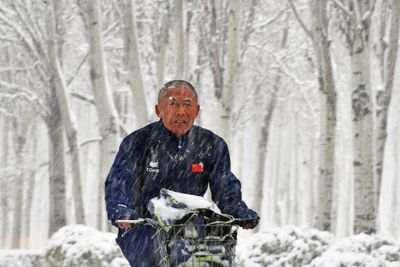 Northeast China sees first major blizzard this season and forecasters warn of record snowfall