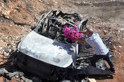 A woman and 3 children are killed by an Israeli airstrike in south Lebanon, local officials say