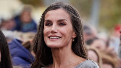 Queen Letizia of Spain's high leather boots and warm grey wrap dress are winter capsule wardrobe essentials