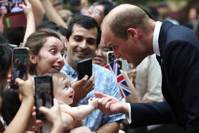 Baby bites Prince William’s finger