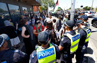 Four arrested and pepper spray used as pro-Palestine protest blocks road to Melbourne Cup course