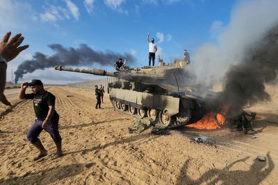 AP PHOTOS: Death, destruction and despair reign a month into Israel-Hamas war