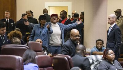 Shouts, tears, boos from crowd force recess of City Council committee meeting during heated migrant debate
