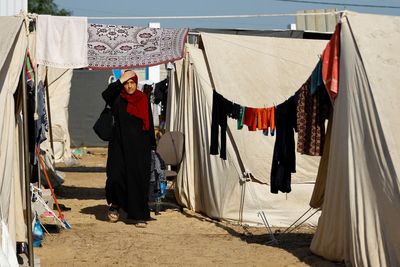 Watch live: Displaced Palestinians gather at Khan Younis refugee camp