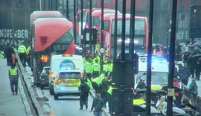 Ambulance heading to emergency blocked as Just Stop Oil clash with police on Waterloo Bridge