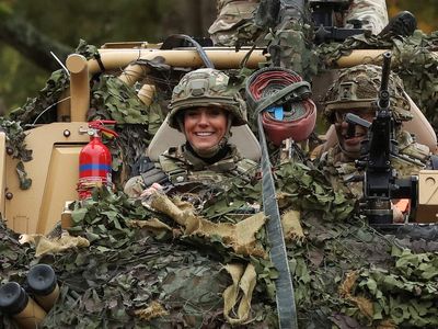 Kate Middleton dons military fatigues and drives seven-tonne armoured truck during regiment visit