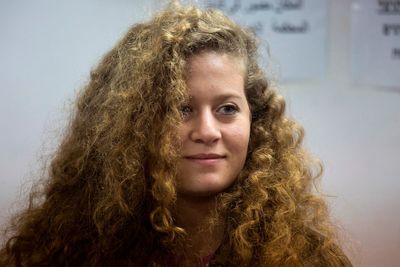 The family of a Palestinian activist jailed for incitement says young woman's account was hacked