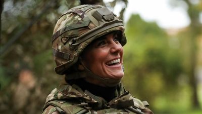 Kate Middleton rocks camo army gear with black skinny jeans and hiking boots - and she was a 'natural at driving seven-tonne vehicle