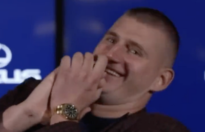 Nikola Jokic’s delightfully delayed reaction to a Nuggets camerawoman falling is so entertaining