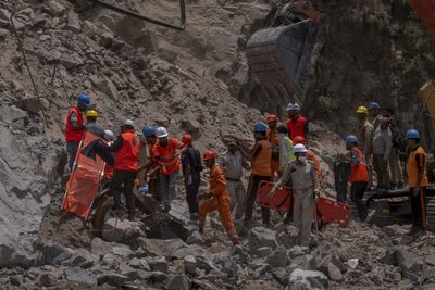 Dozens of workers feared trapped after India tunnel collapse