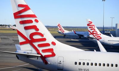 ‘Poverty pay’: travellers may soon face airport disruption as Virgin Australia crew close in on striking
