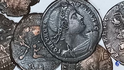 Scuba diver discovers 30,000 astonishingly well-preserved Roman coins off Italian coast