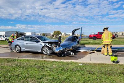 Small plane crashes into car after overshooting runway during emergency landing near Dallas