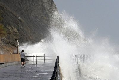 Storms batter southern England as flooding causes travel disruption