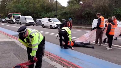 Just Stop Oil: 23 activists arrested as they block rush-hour traffic near Oval
