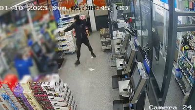 Video shows terrifying moment gunman holds up Tesco during spate of armed robberies in north London