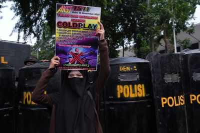 Conservative Muslims in Indonesia protest Coldplay concert over the band's LGBTQ+ support