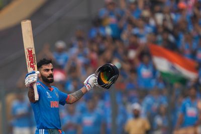 Virat Kohli hits record century as India post huge score in semi-final