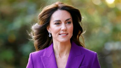 Kate Middleton delivers bold glamour with Quality Street purple suit and iconic sapphire drop earrings