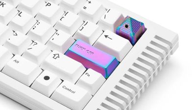 You can now buy a limited edition 'F*** off' keycap for $40 and a pyramid shaped escape key that stabs you if that's your idea of fun