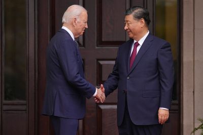 Biden and Xi greet each other with a warm handshake on the sidelines of APEC. Follow live updates