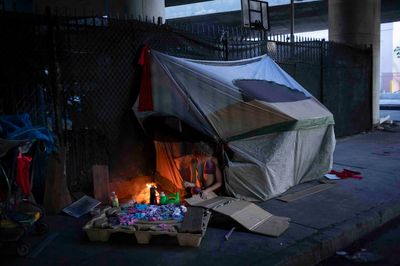 Los Angeles criticized for its handling of homelessness after 16 homeless people escape freeway fire
