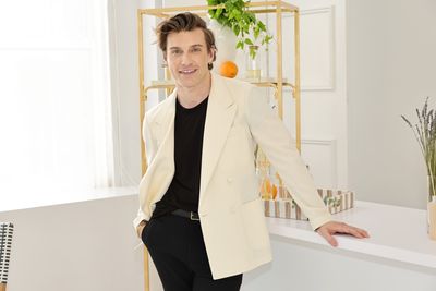 Jeremiah Brent just decorated a fun, festive mantel using Crate & Barrel's Christmas collection
