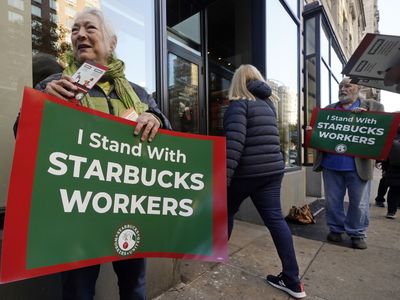 Thousands of Starbucks workers go on a one-day strike on one of chain's busiest days